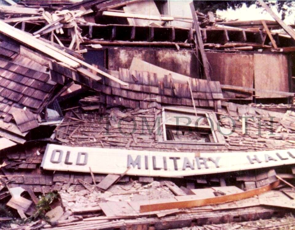 Old Military Hall sign post-fire 1979